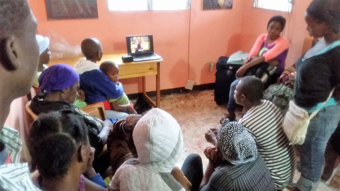Showing the Jesus Film to the people who sought shelter in my home.